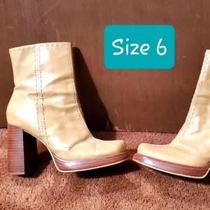 Tan high heeled boots